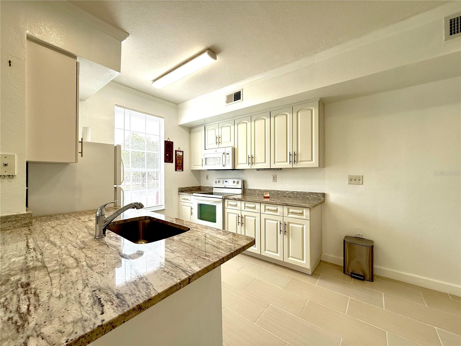 Image 5 of 25 For 9650 Lake Chase Island Way 9650