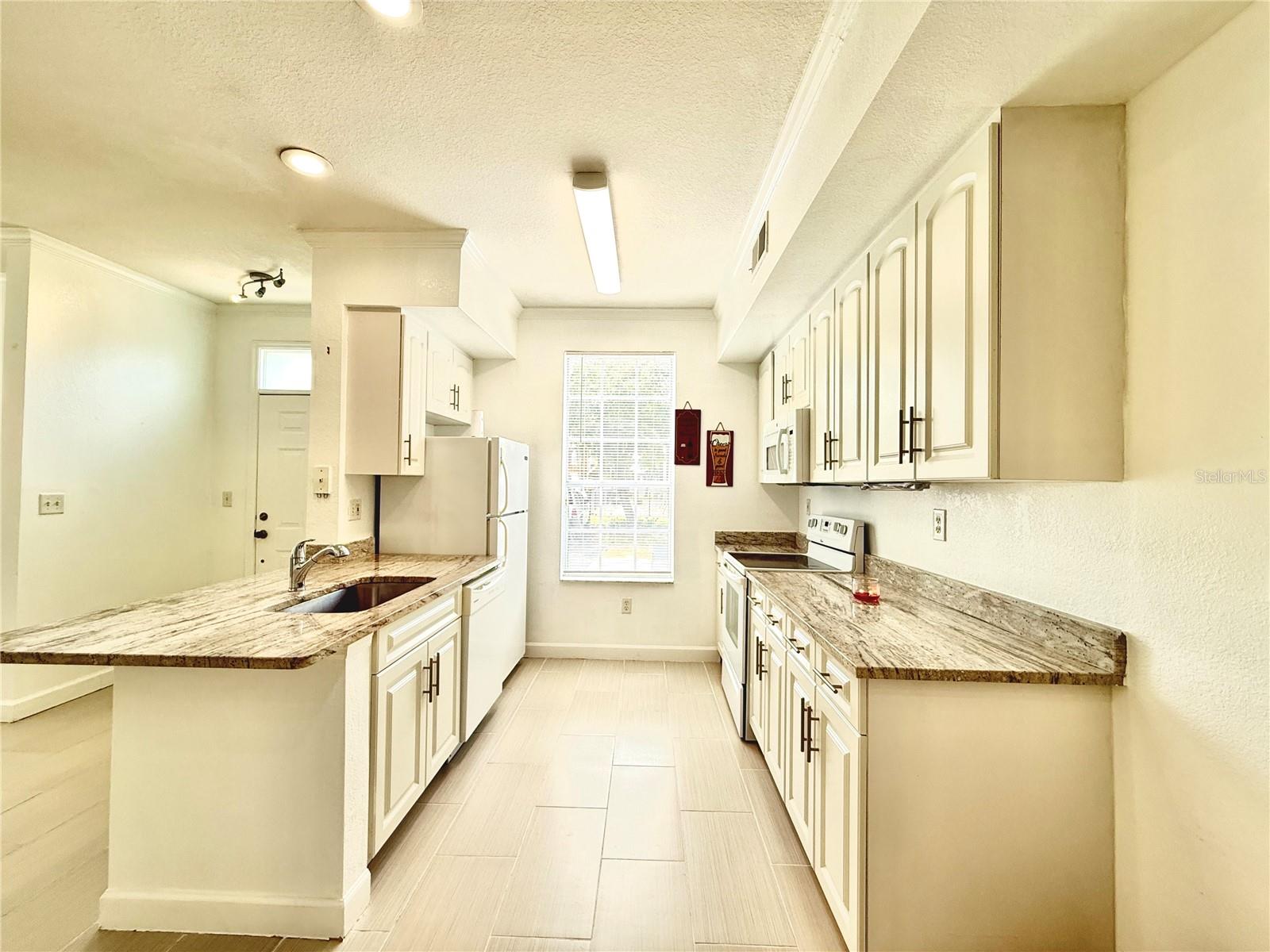 Image 6 of 25 For 9650 Lake Chase Island Way 9650