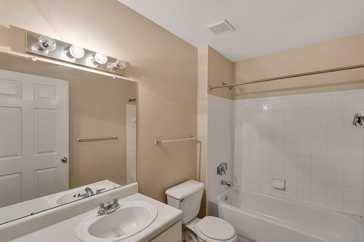 Image 21 of 35 For 9414 Lake Chase Island Way 9414