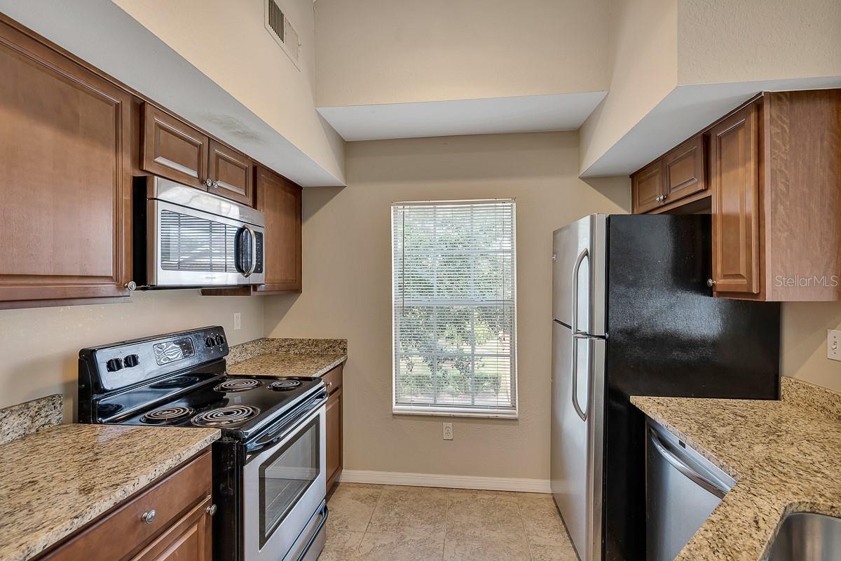 Image 8 of 35 For 9414 Lake Chase Island Way 9414