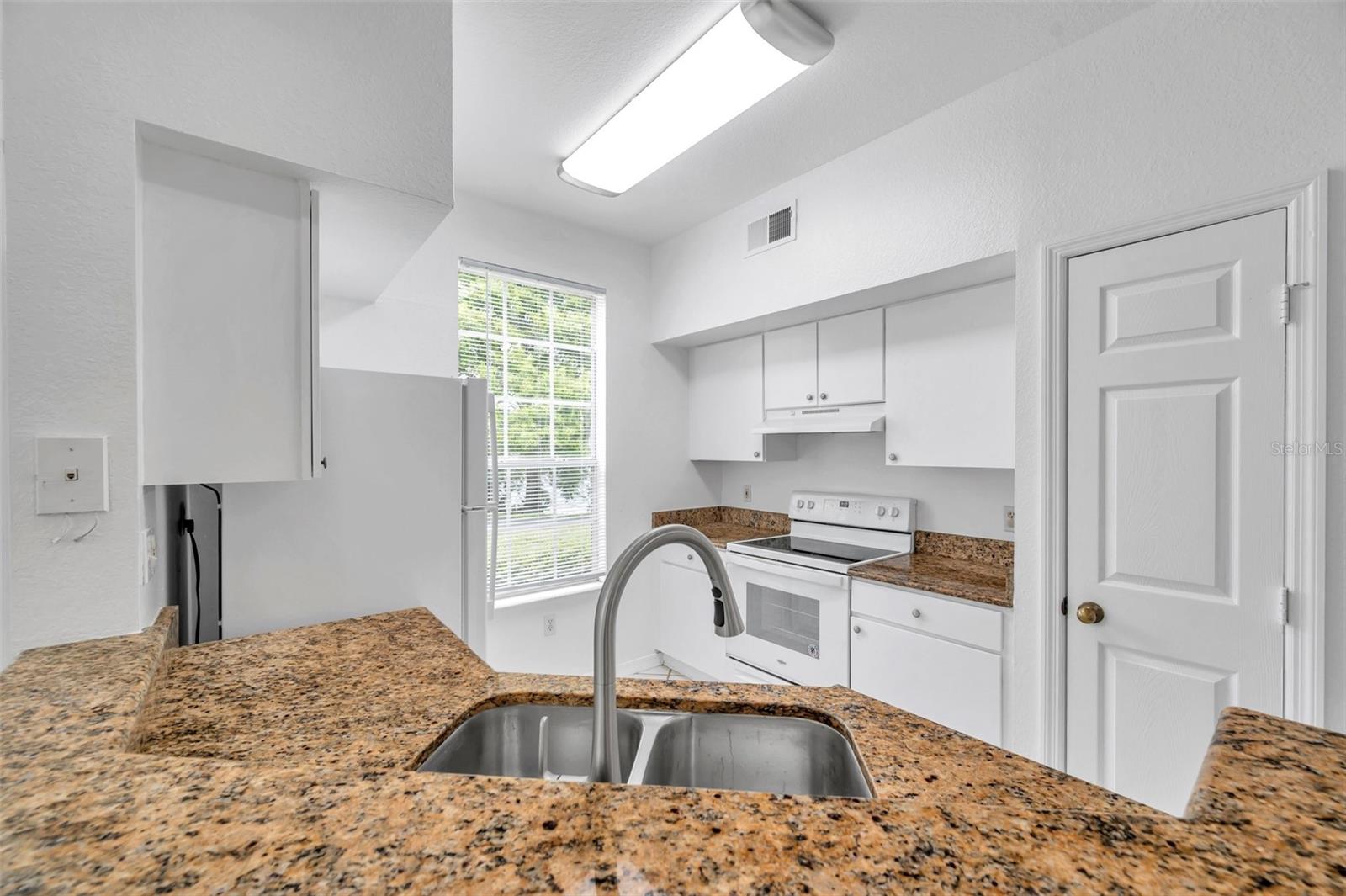 Image 16 of 51 For 9602 Lake Chase Island Way 9602