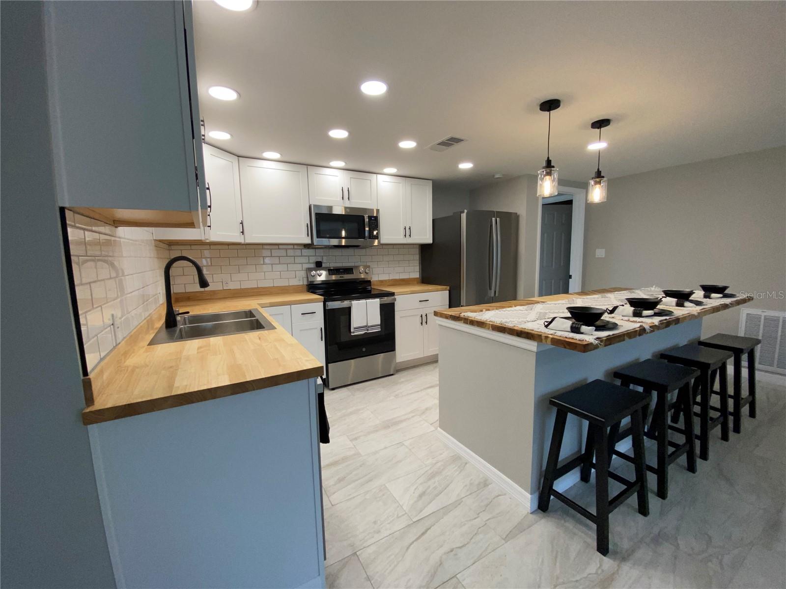 Image 9 of 28 For 12907 College Hill Drive