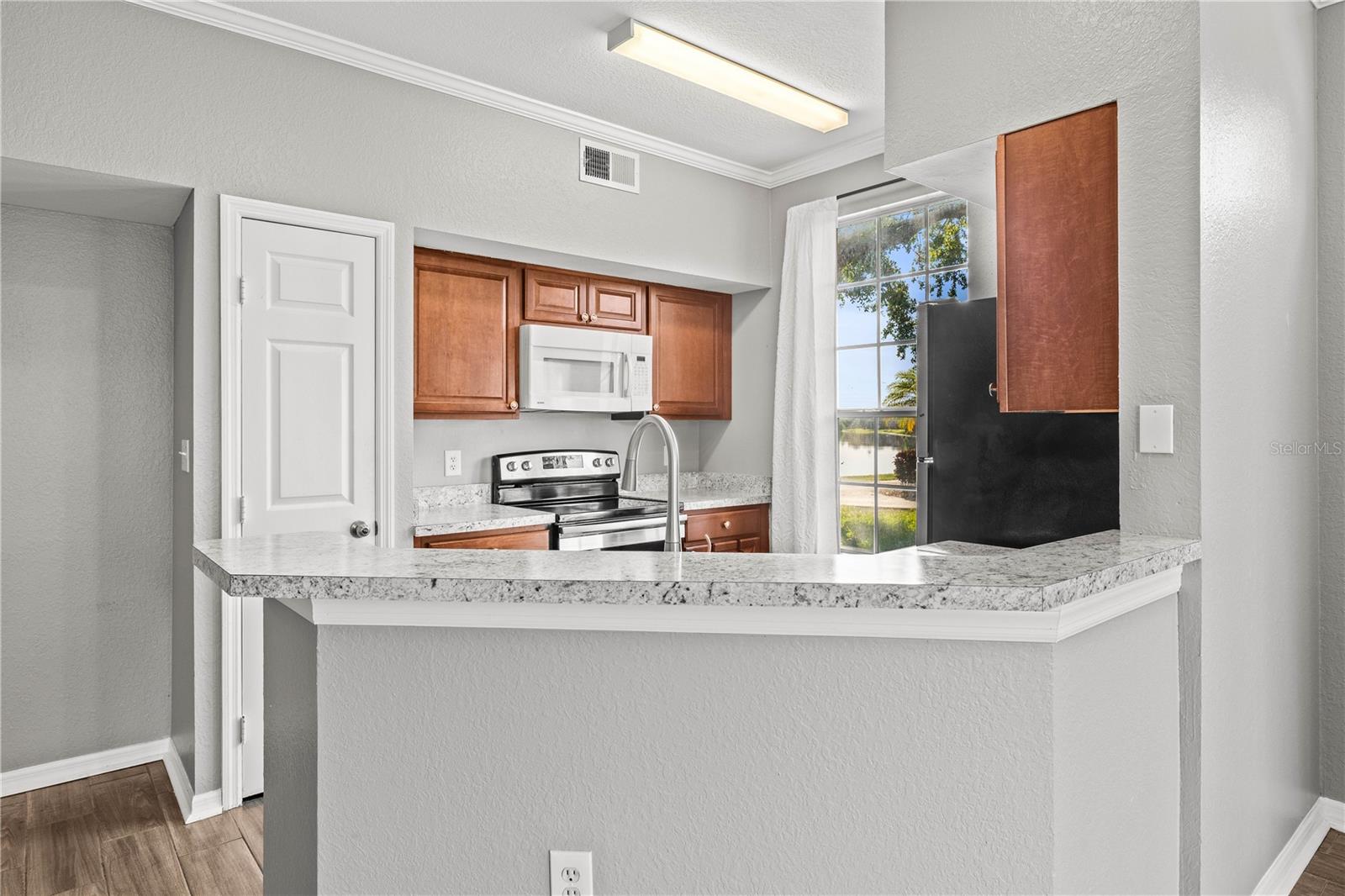 Image 11 of 30 For 9416 Lake Chase Island Way 9416
