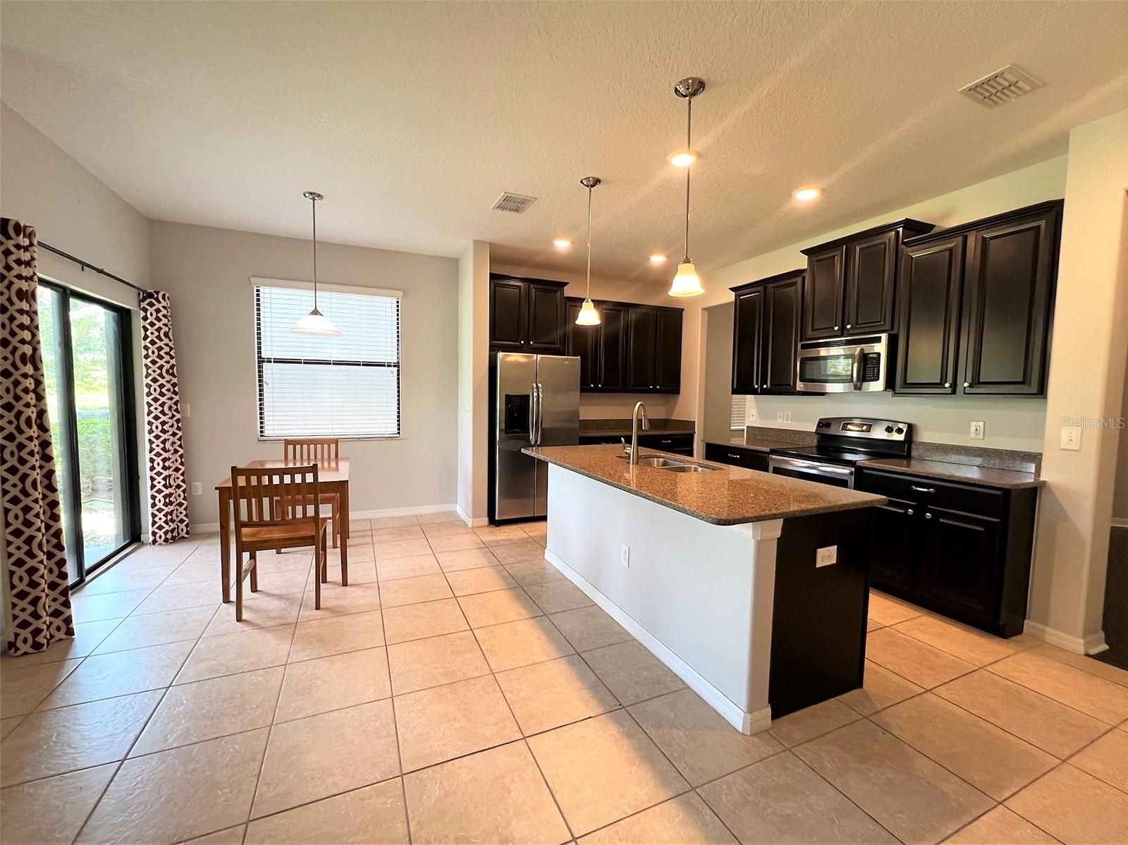 Listing photo id 1 for 1221 Ballard Green Place