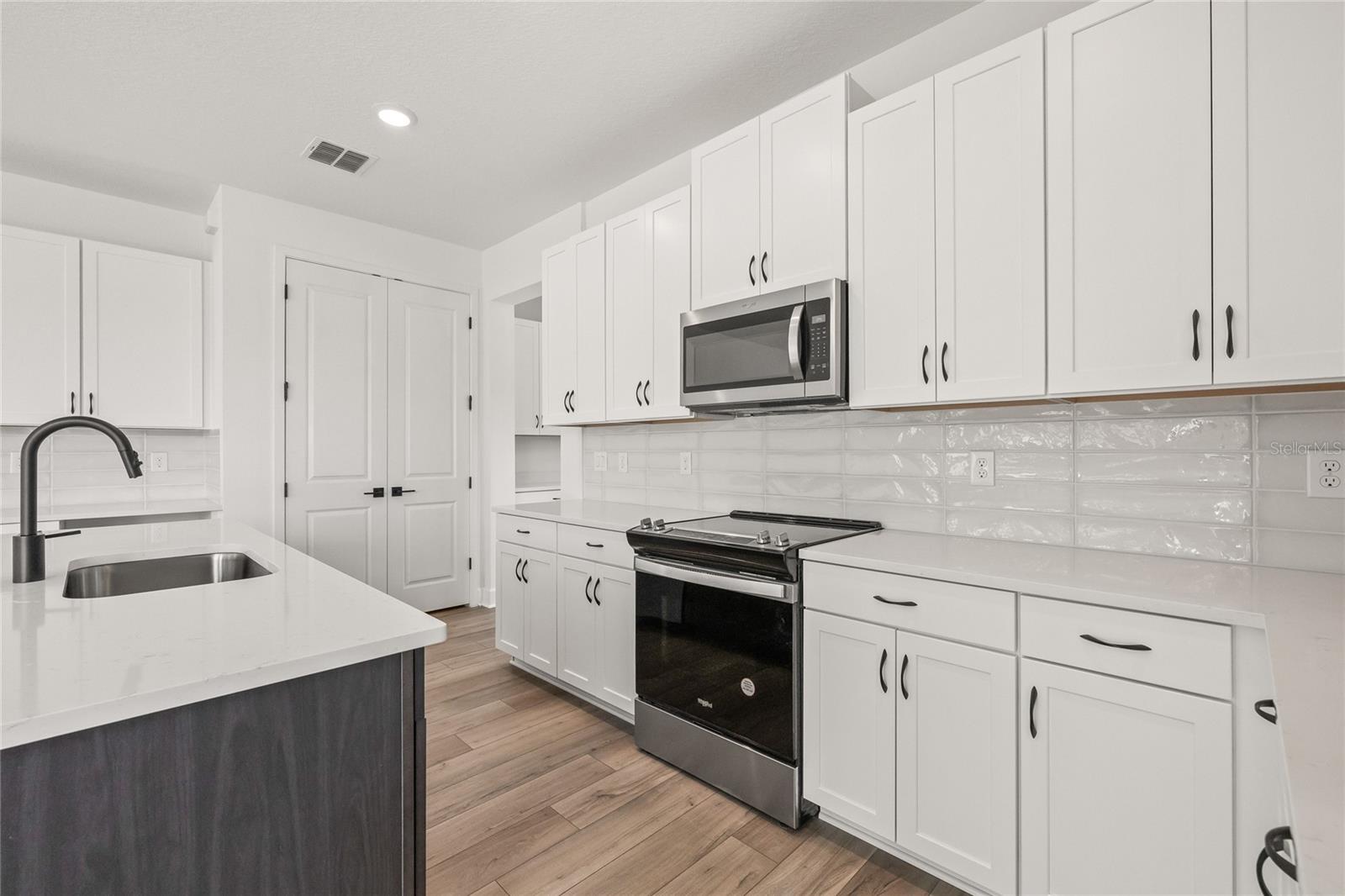 Image 15 of 39 For 2039 Amelia Bay Place