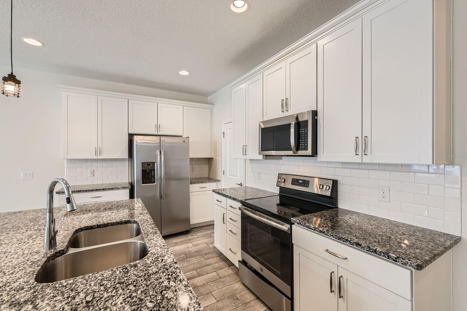 Image 9 of 28 For 11018 Hanlon Terrace Alley