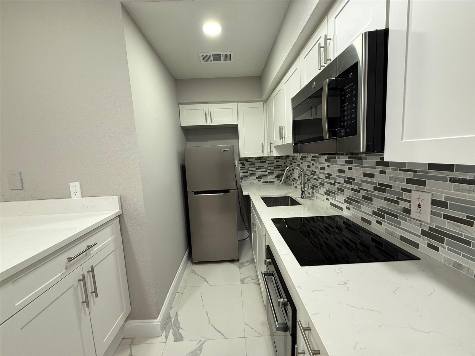 Image 4 of 14 For 9258 Lake Chase Island Way 9258