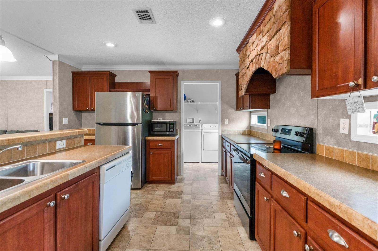 Image 12 of 33 For 7312 Manhattan Drive