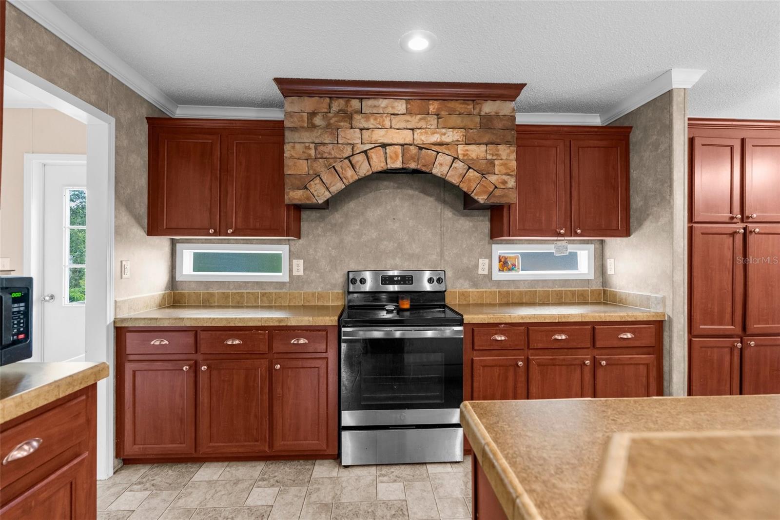 Image 14 of 33 For 7312 Manhattan Drive