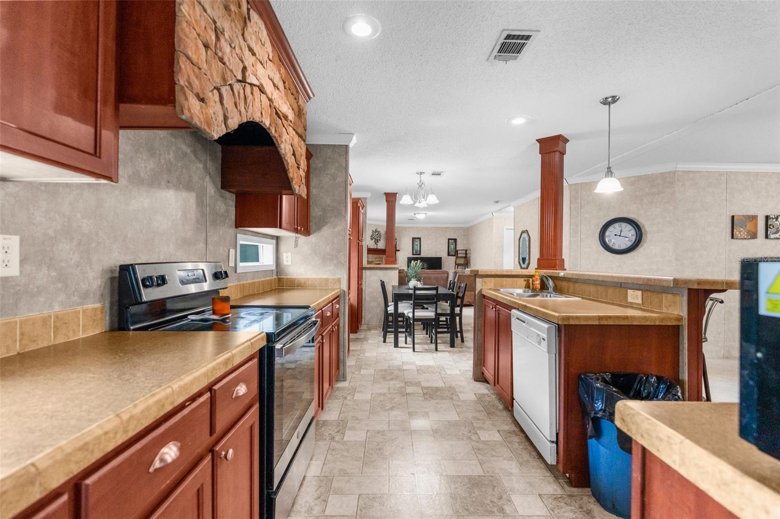 Image 16 of 33 For 7312 Manhattan Drive