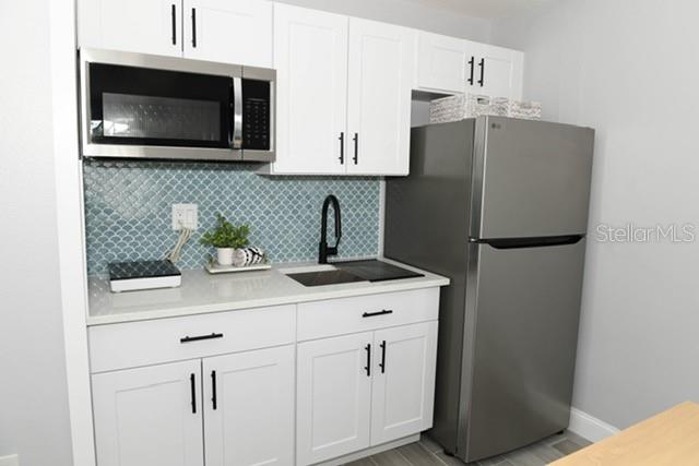 Image 4 of 14 For 9034 Westbay Boulevard