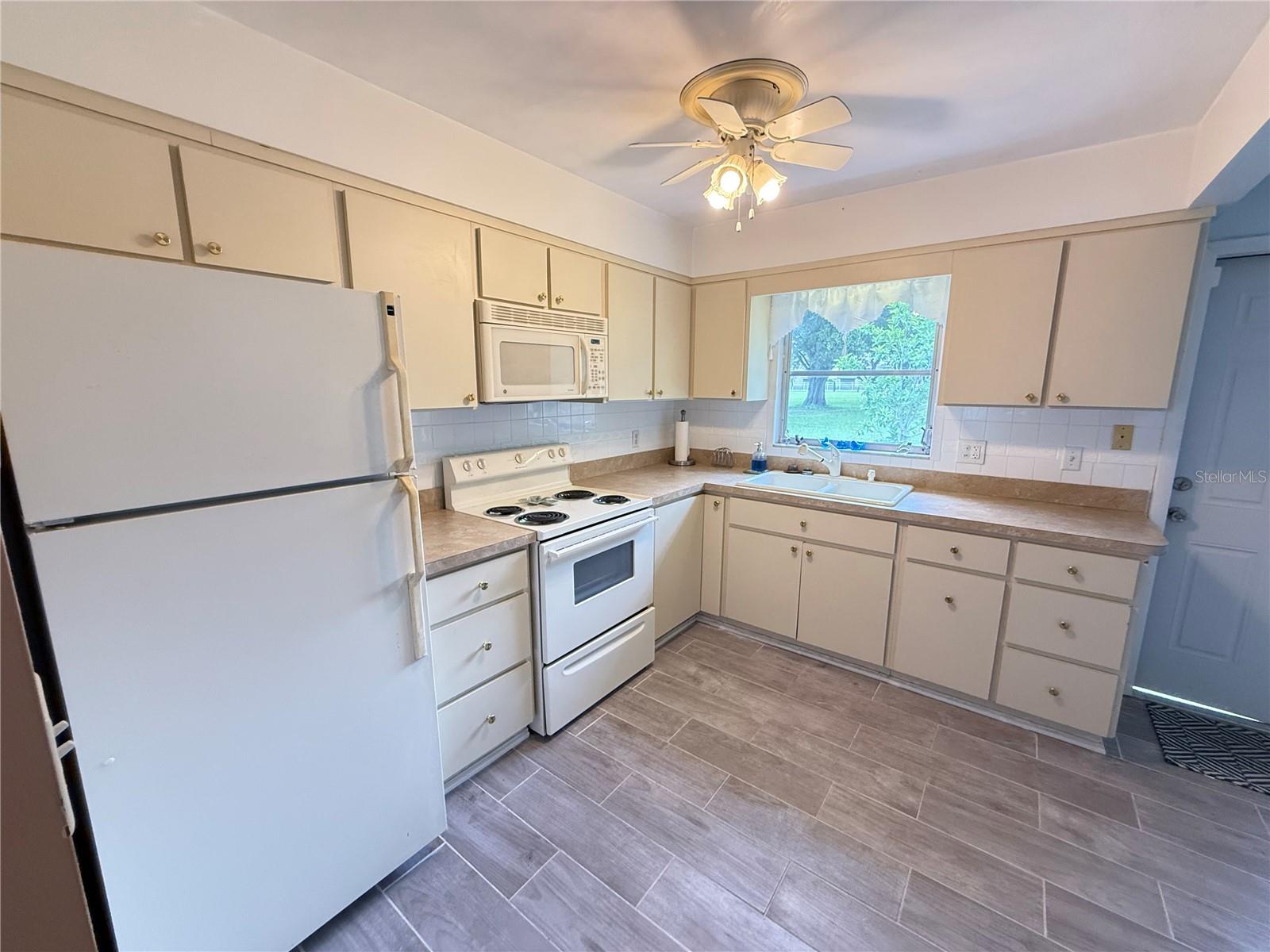 Image 7 of 42 For 8215 Burgundy Drive N 8215