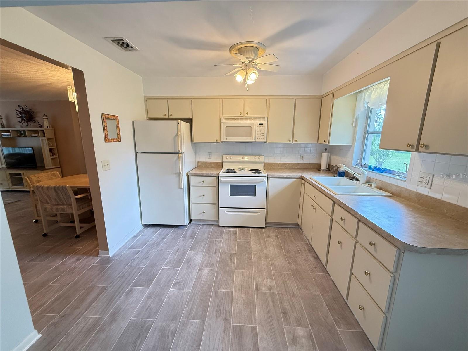 Image 8 of 42 For 8215 Burgundy Drive N 8215