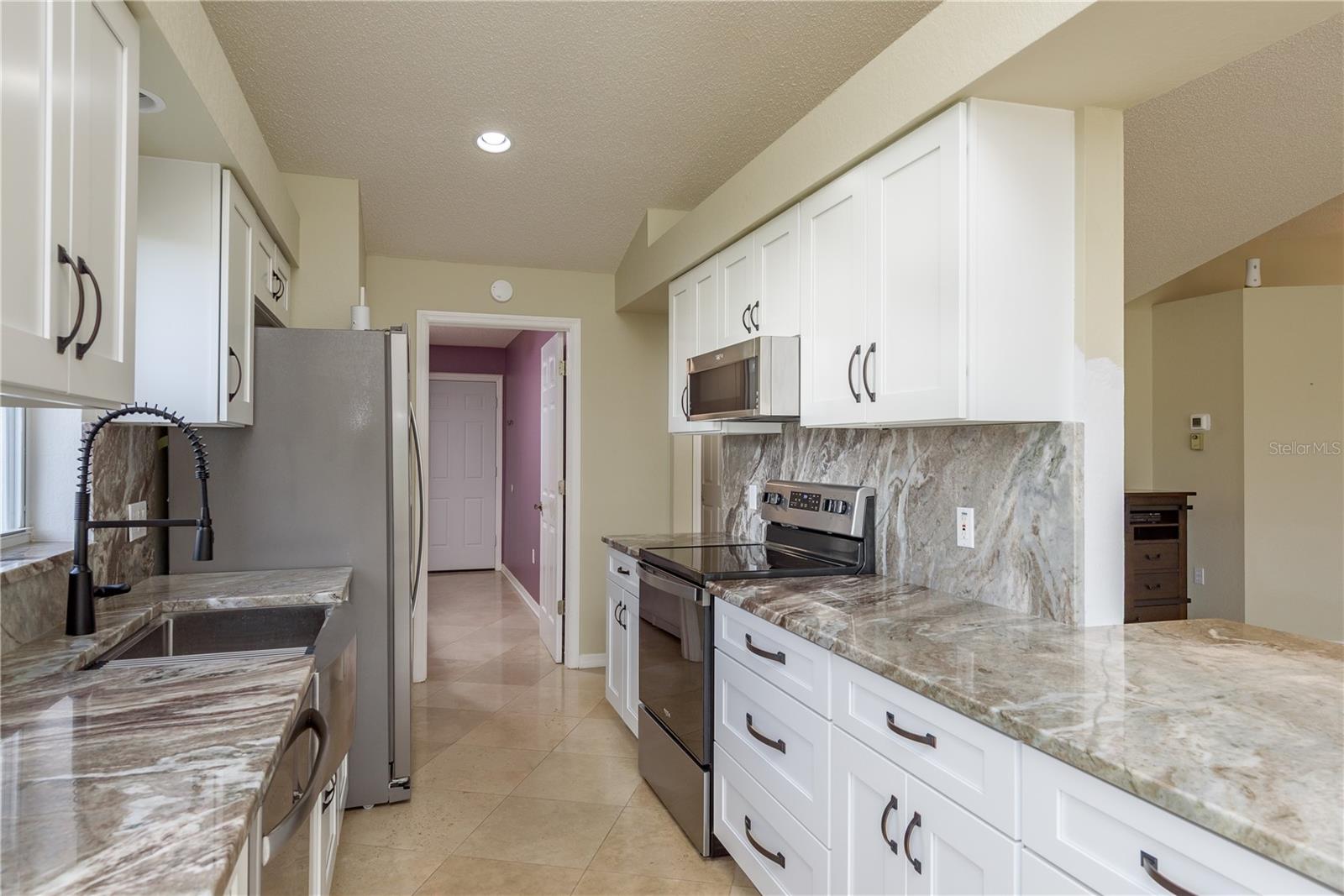 Image 11 of 38 For 9223 Bonnie Cove Drive