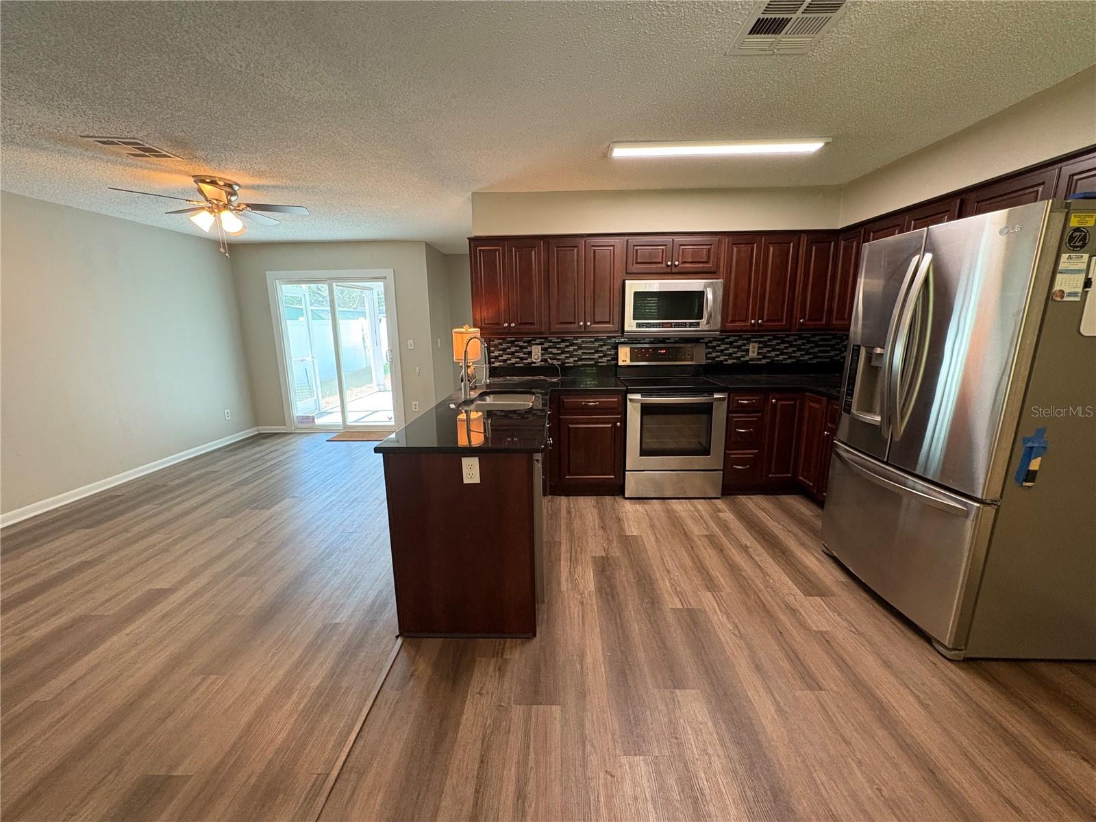 Image 4 of 14 For 7412 Manhattan Drive