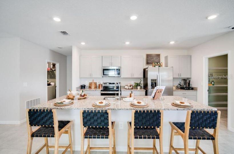 Listing photo id 2 for 13613 Tropical Breeze Way