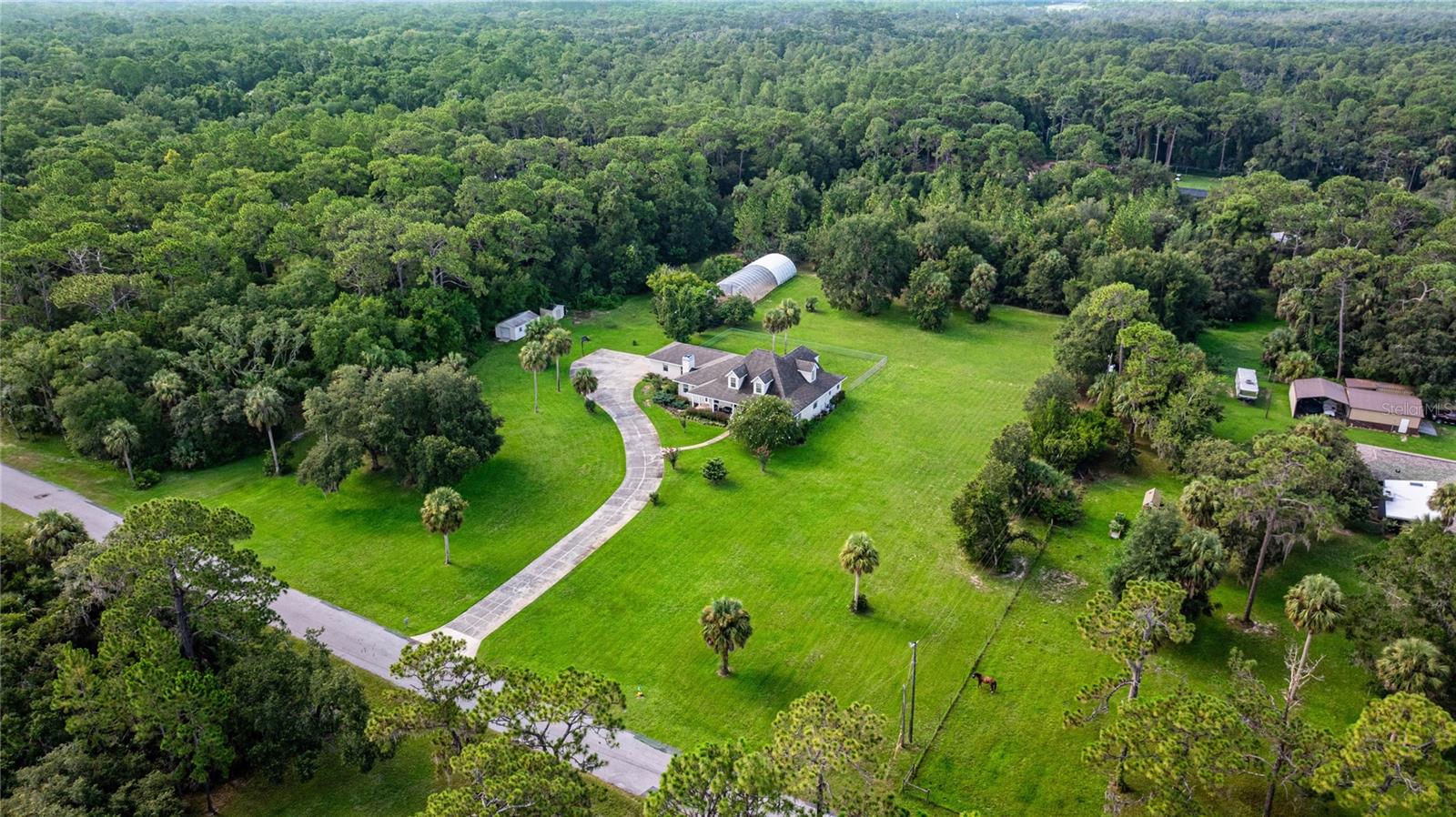 Listing photo id 77 for 10264 Springtree Lane