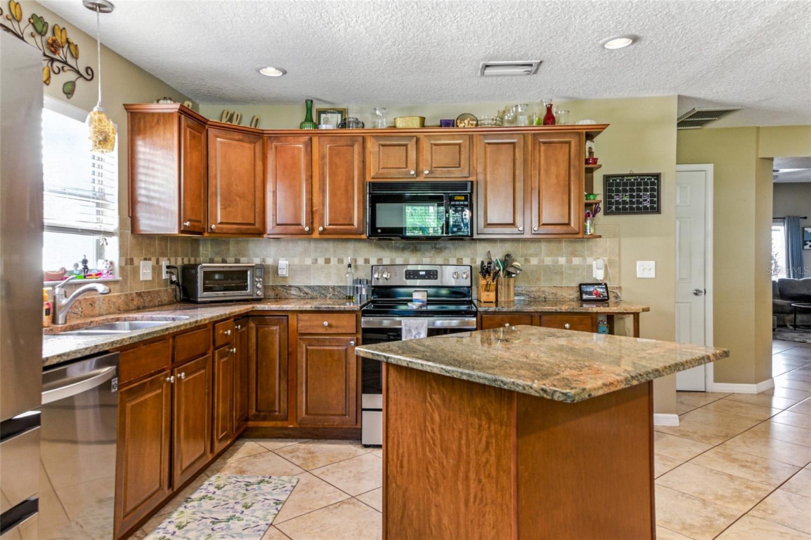 Image 14 of 54 For 9540 Pebble Glen Avenue