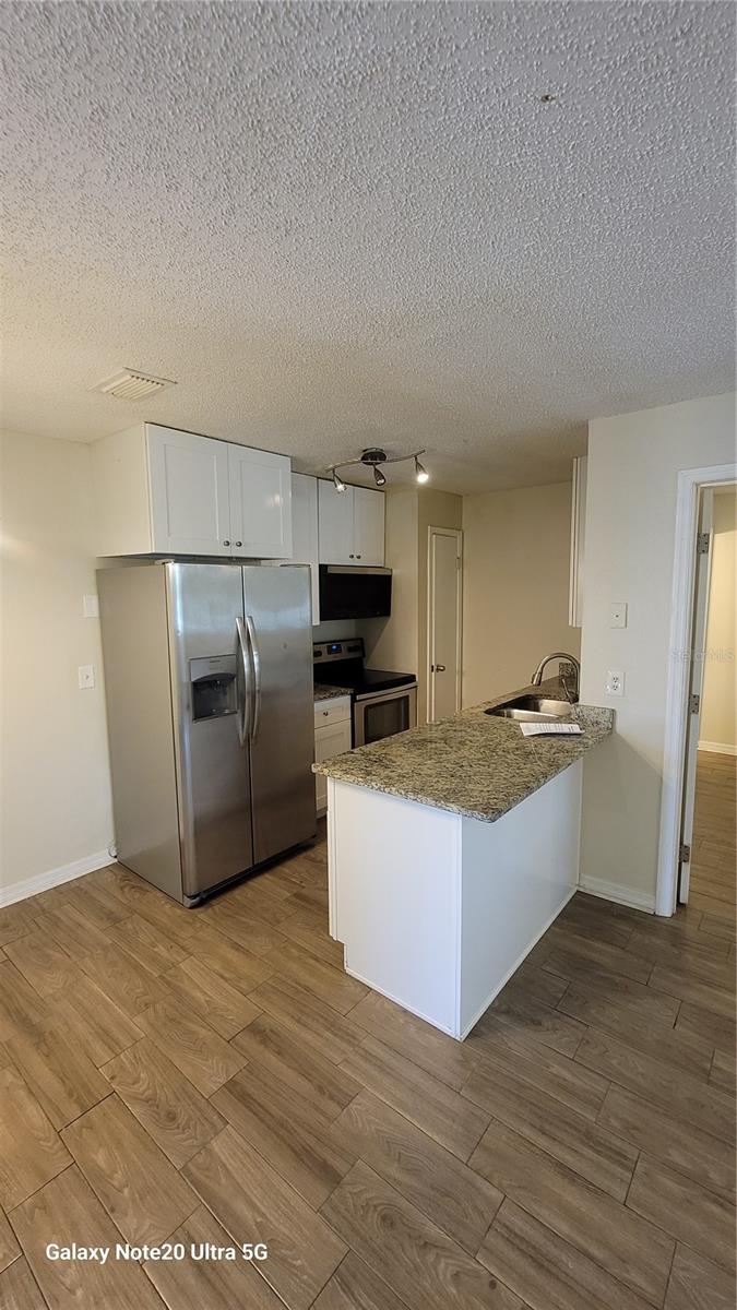 Image 2 of 12 For 640 Golden Raintree Place