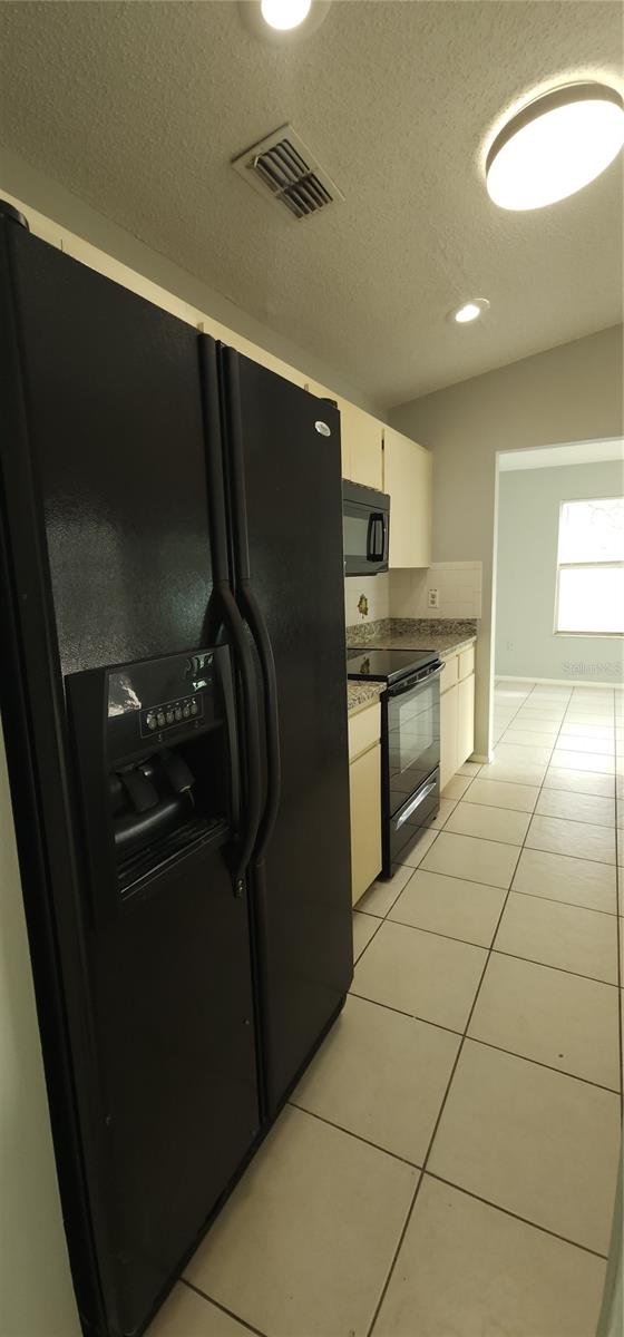 Image 5 of 27 For 7515 Leon Avenue