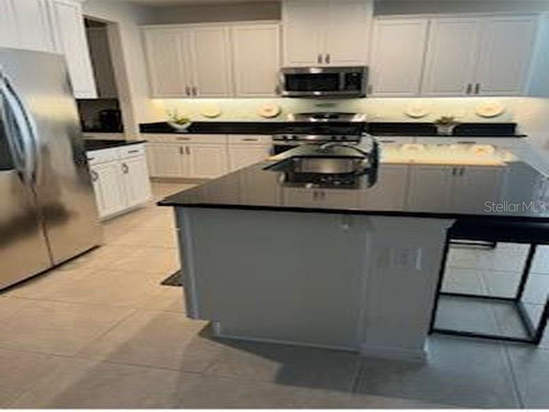 Image 5 of 21 For 10429 Macfarlane Place