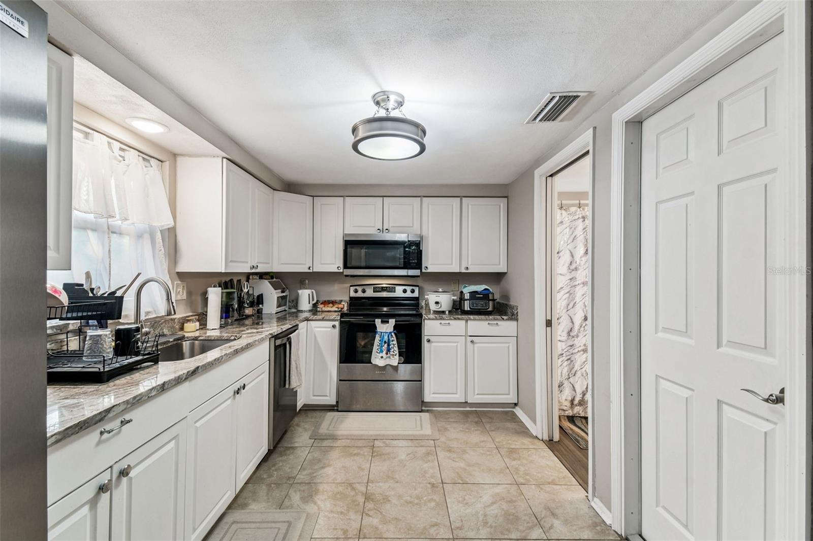 Image 14 of 68 For 7810 Birchwood Dr