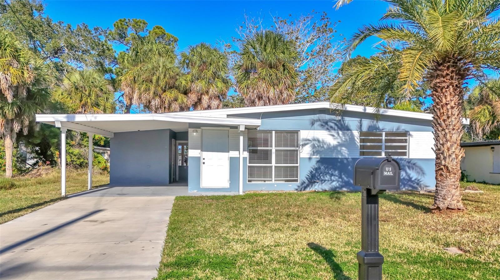 Listing photo id 1 for 7308 Royal Palm Drive