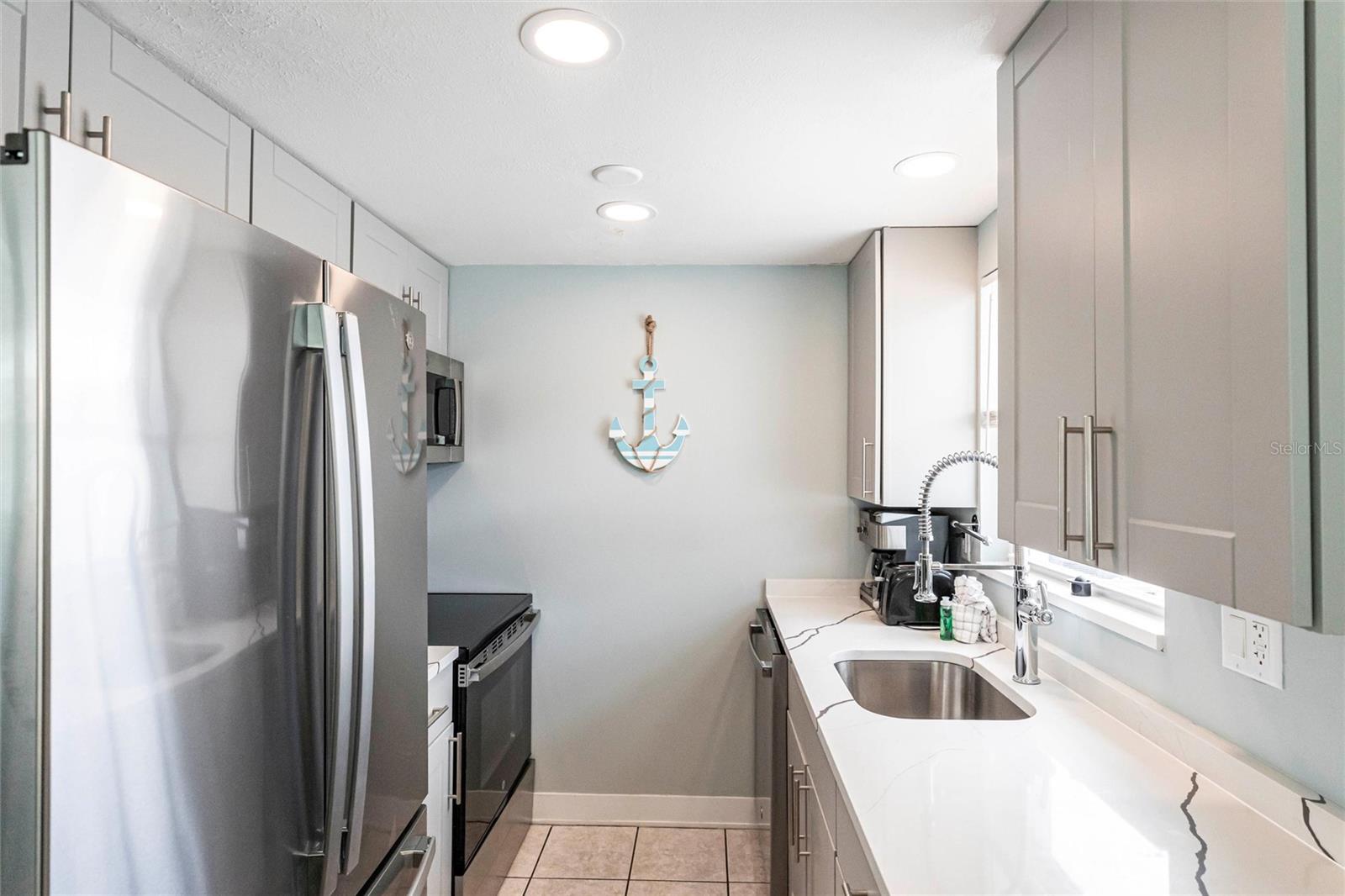 Image 7 of 38 For 6020 Midnight Pass Road 49