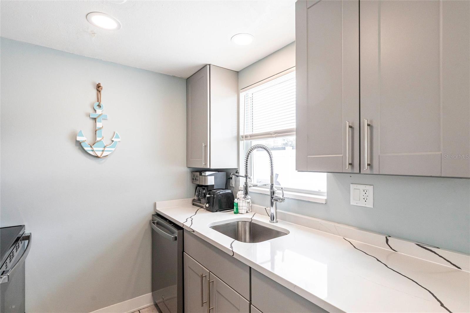 Image 8 of 38 For 6020 Midnight Pass Road 49