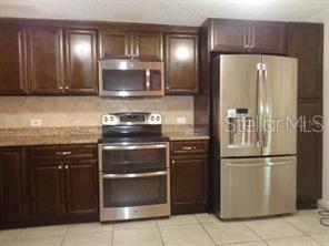 Image 4 of 28 For 9105 Tudor Drive 203