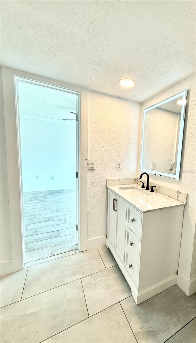 Image 12 of 28 For 8901 Blind Pass Road 128