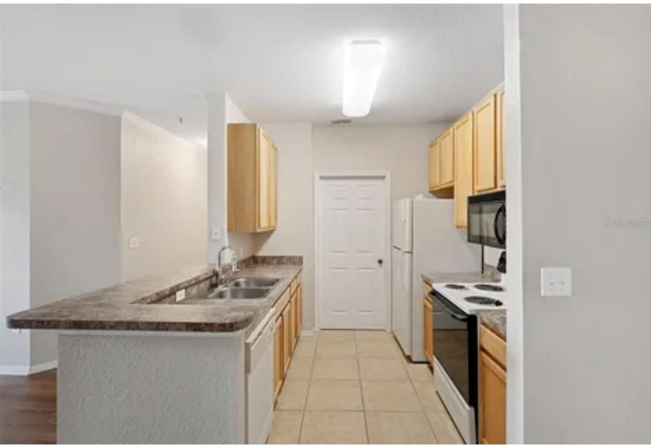 Image 13 of 23 For 10209 Courtney Palms Boulevard 204