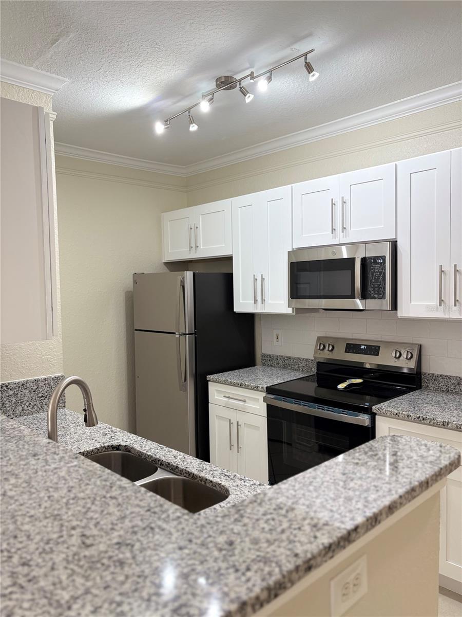 Image 10 of 19 For 4323 Bayside Village Drive 202