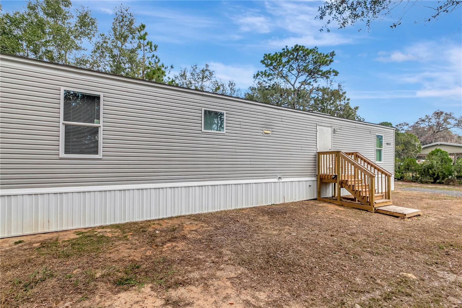 Image 5 of 38 For 9859 Sunny Day Court