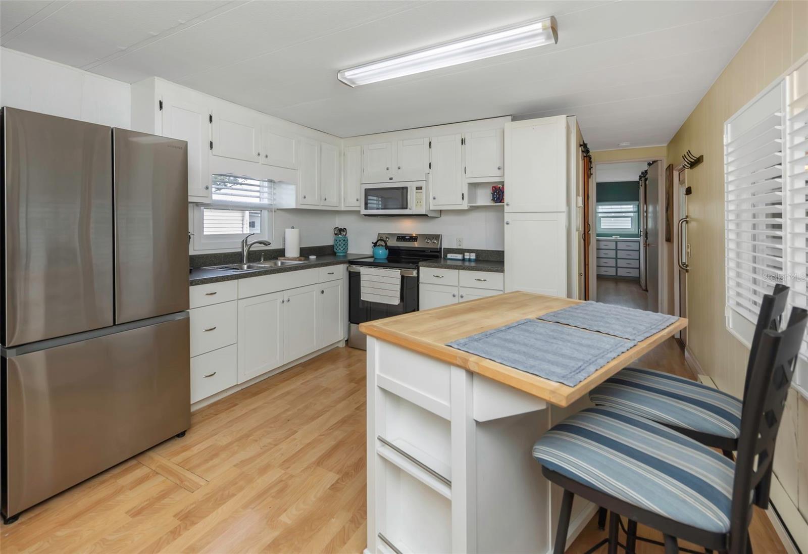 Image 11 of 60 For 1100 Belcher Road S 210