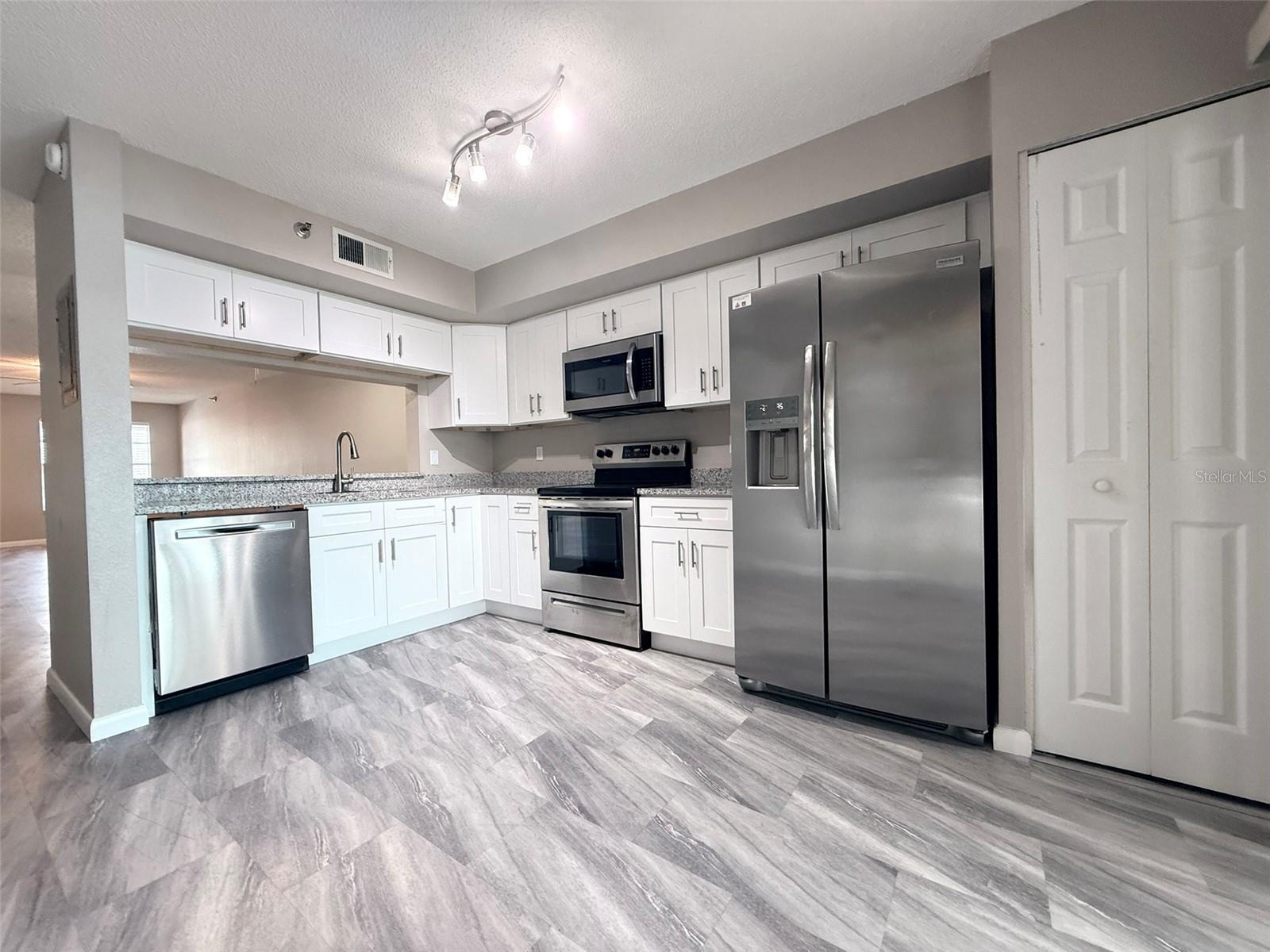 Image 9 of 28 For 7218 Bank Drive 205