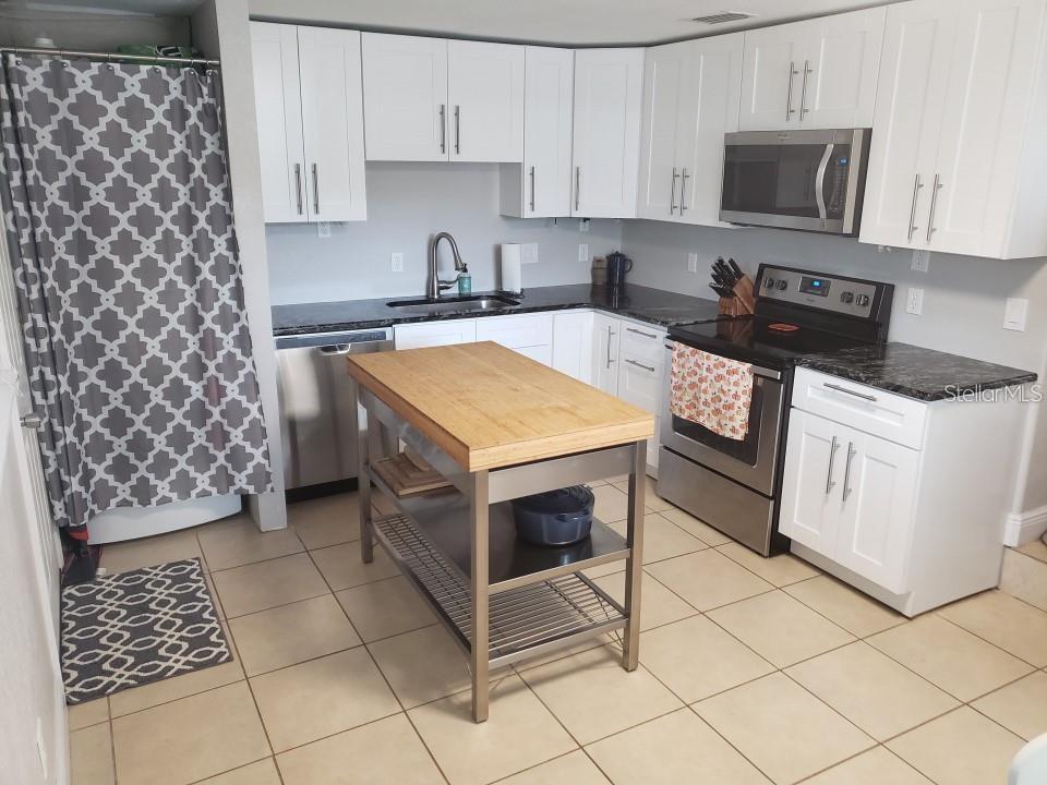 Image 7 of 15 For 1704 Lois Avenue