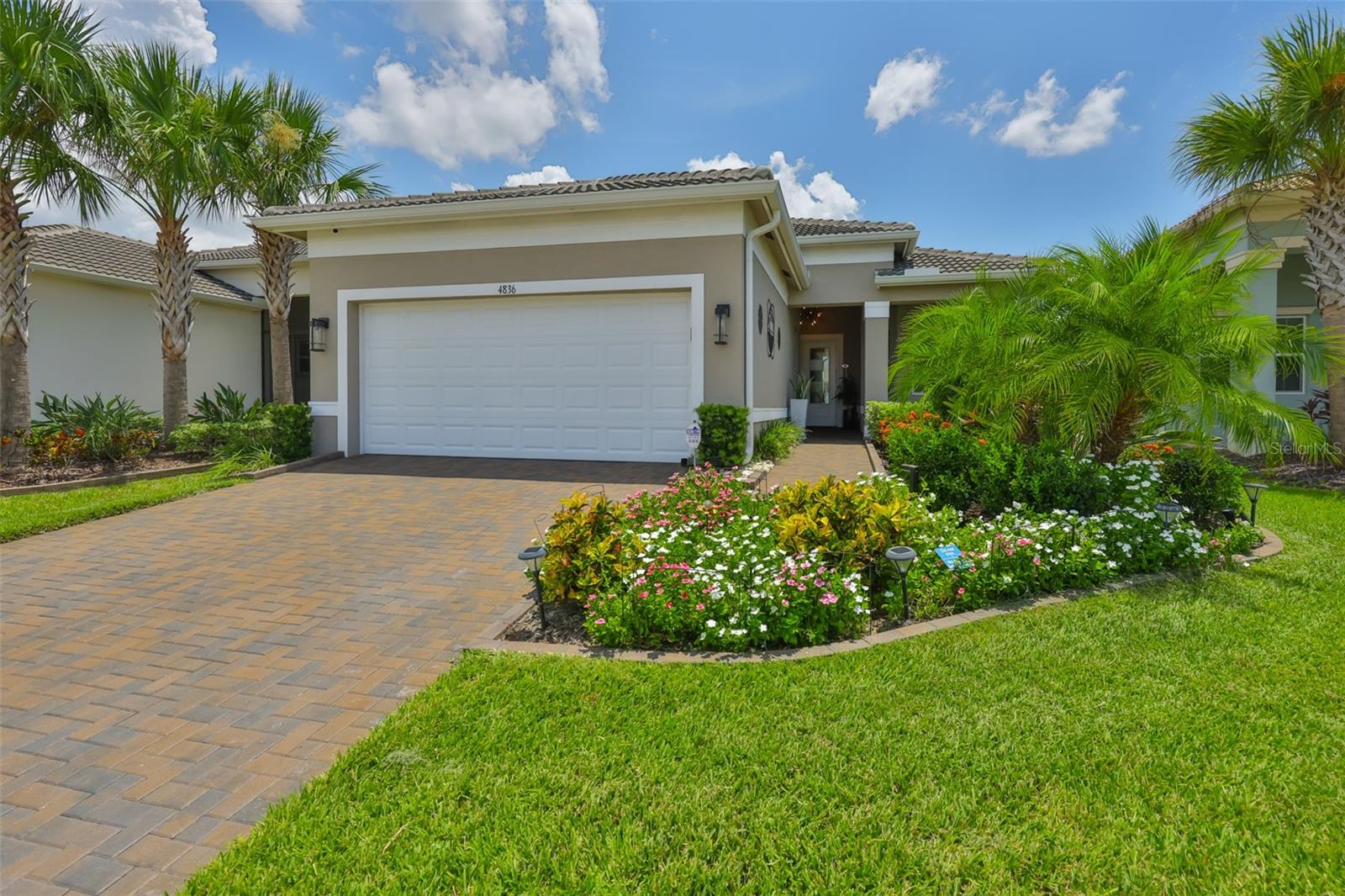 Listing photo id 0 for 4836 Sevilla Shores Drive