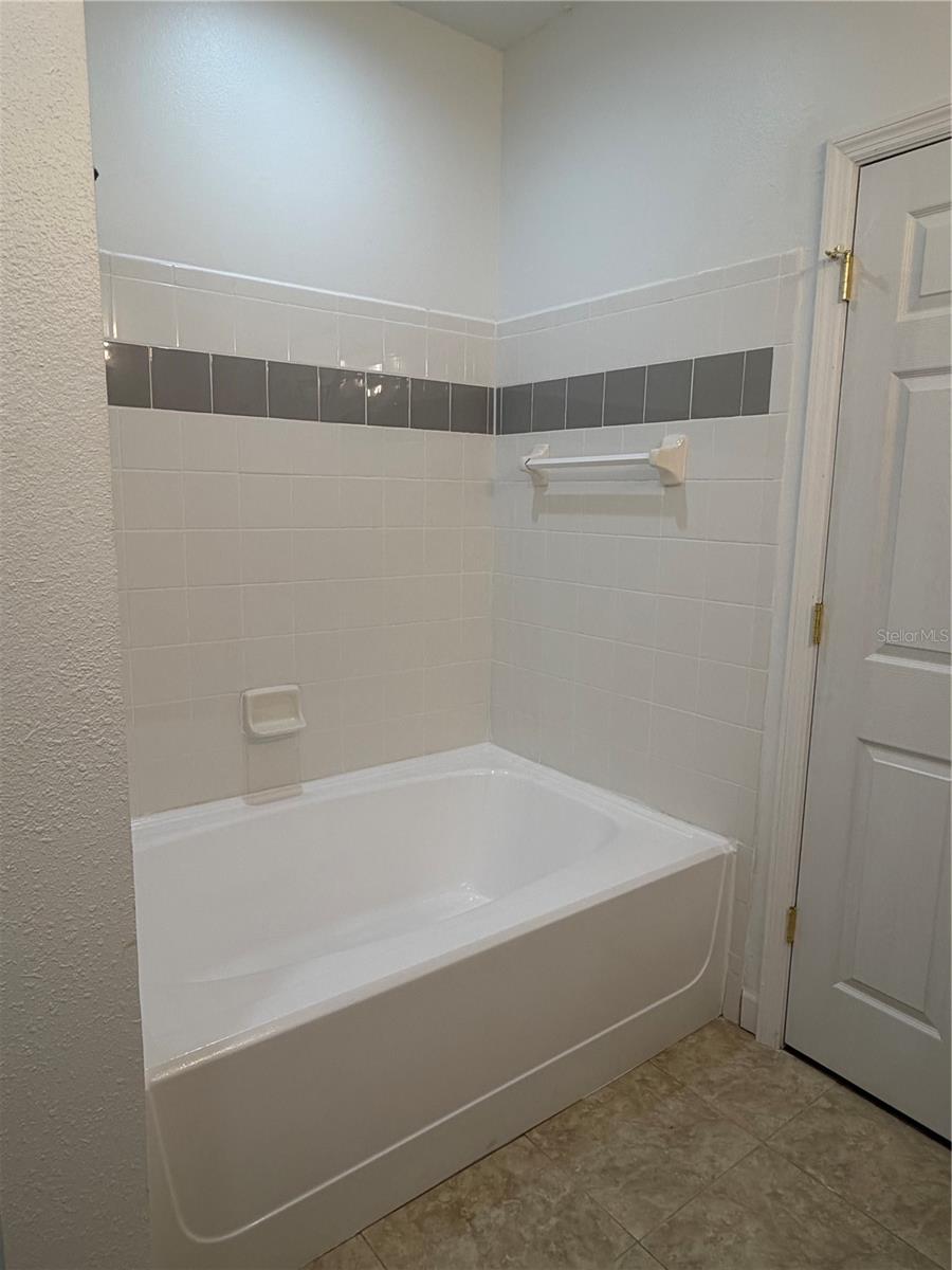 Image 16 of 26 For 9818 Lake Chase Island Way 9818