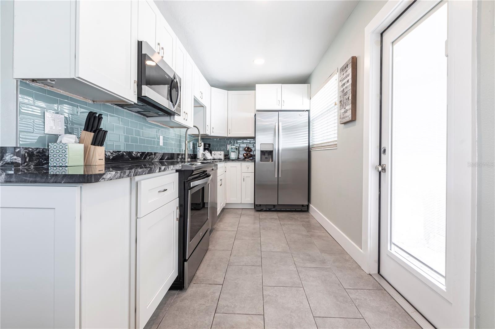 Image 8 of 13 For 6020 Midnight Pass Road 35