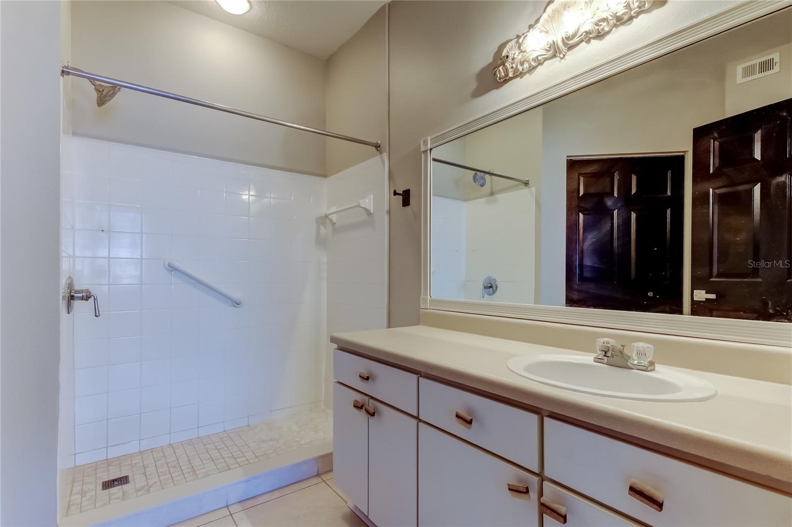 Image 16 of 29 For 9750 Lake Chase Island Way 9750