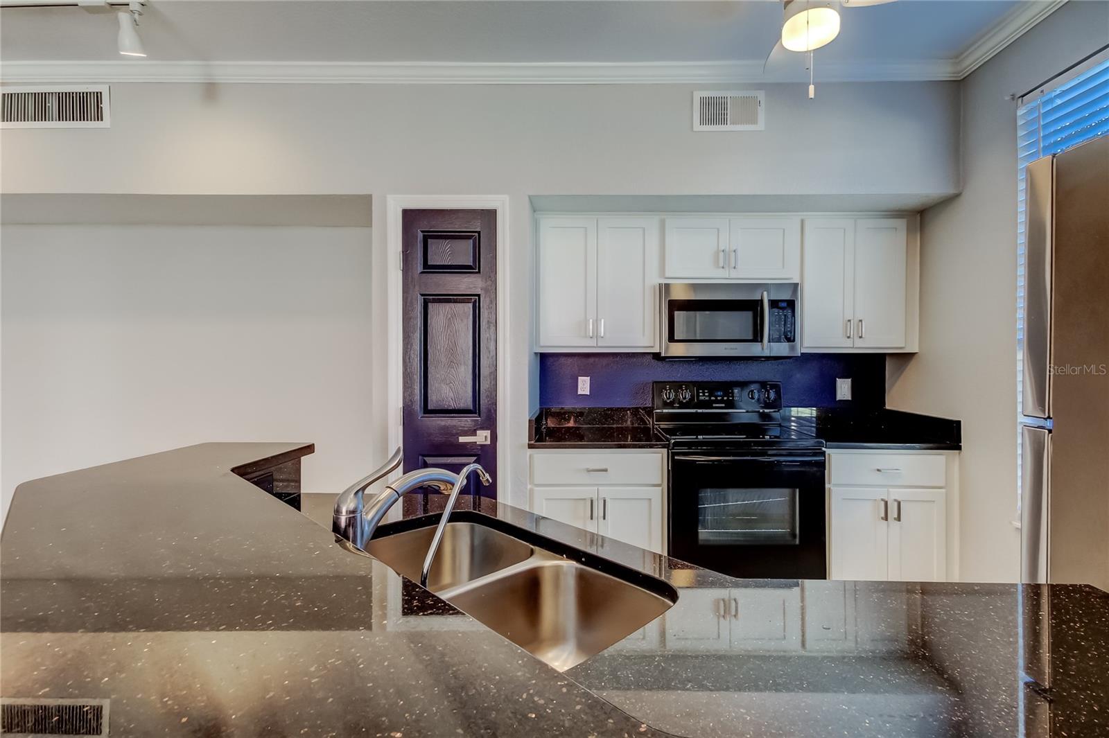 Image 9 of 29 For 9750 Lake Chase Island Way 9750