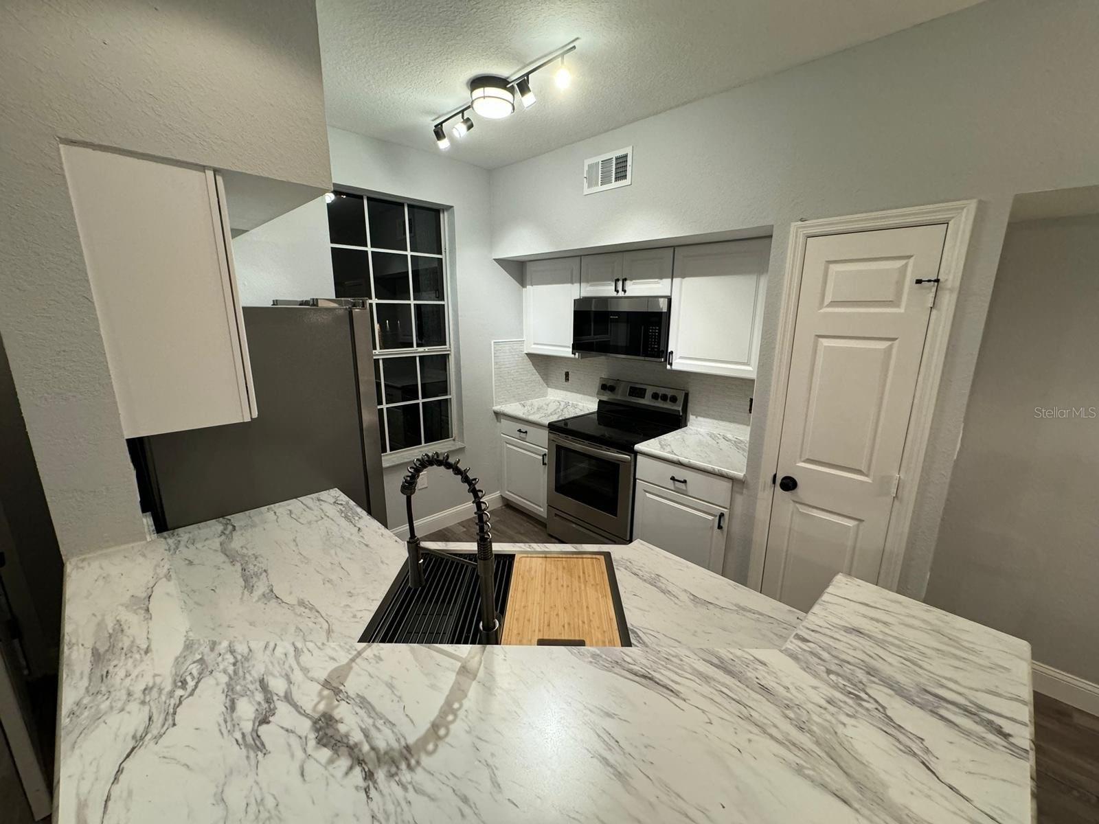 Image 12 of 30 For 9820 Lake Chase Island Way 9820