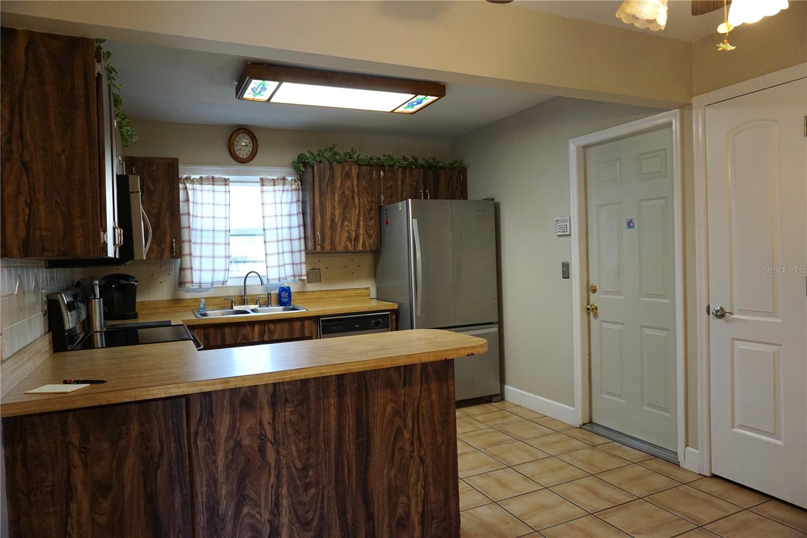 Image 9 of 34 For 6522 Woodland Boulevard N