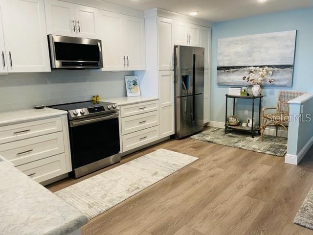 Image 7 of 32 For 113 1st Street E 103