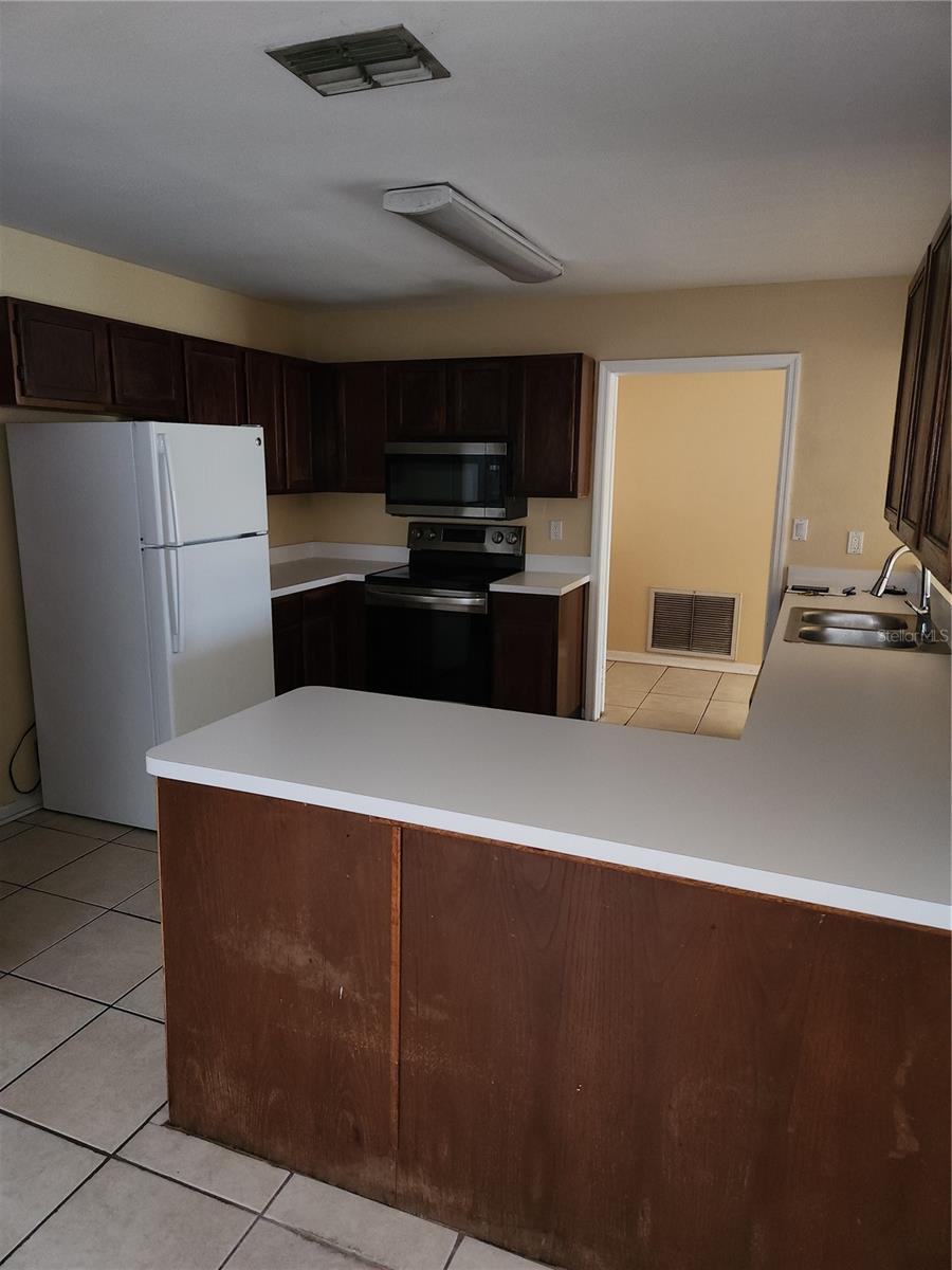 Image 4 of 14 For 8748 Hampden Drive