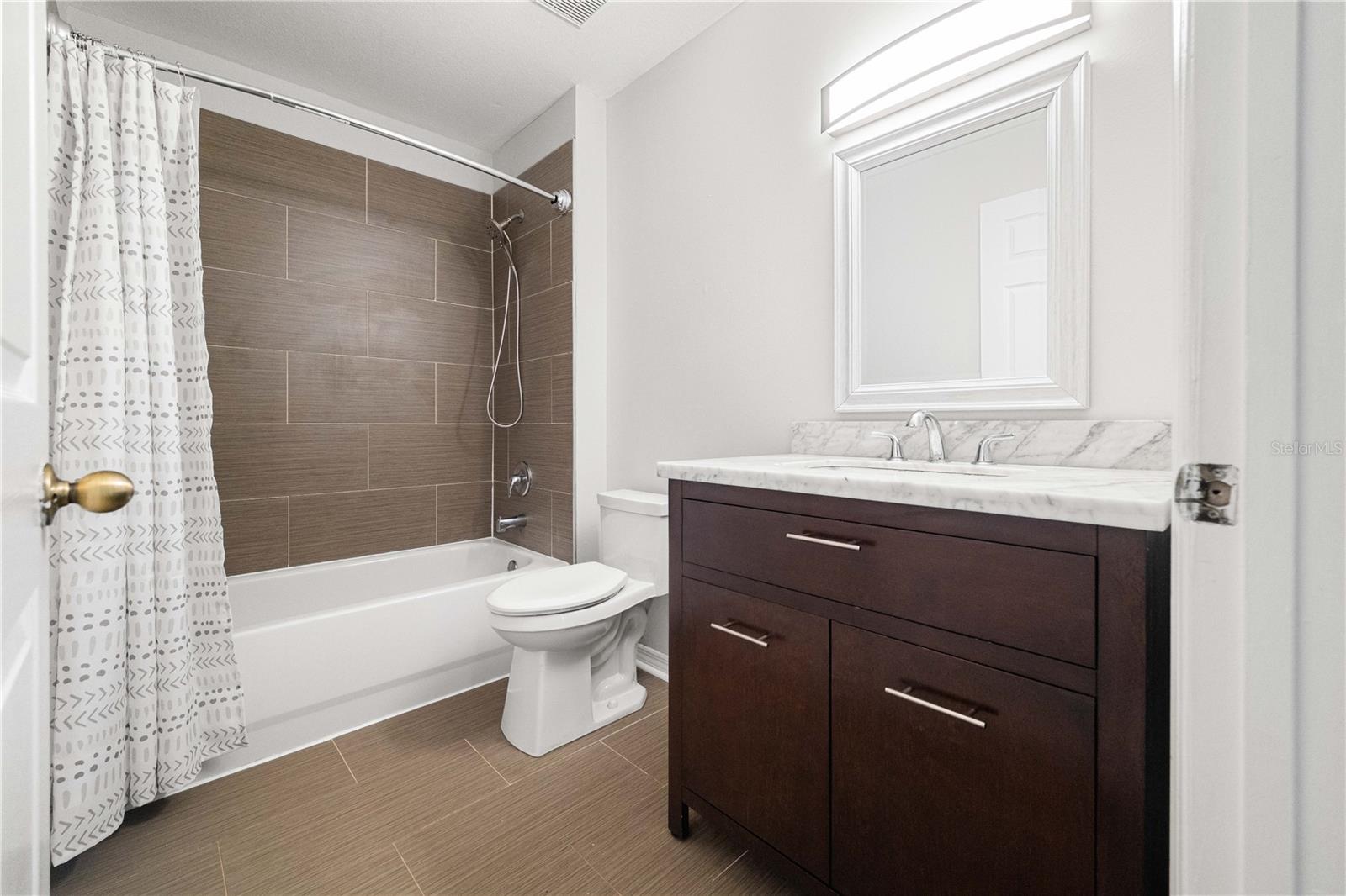 Image 24 of 38 For 9412 Lake Chase Island Way 9412