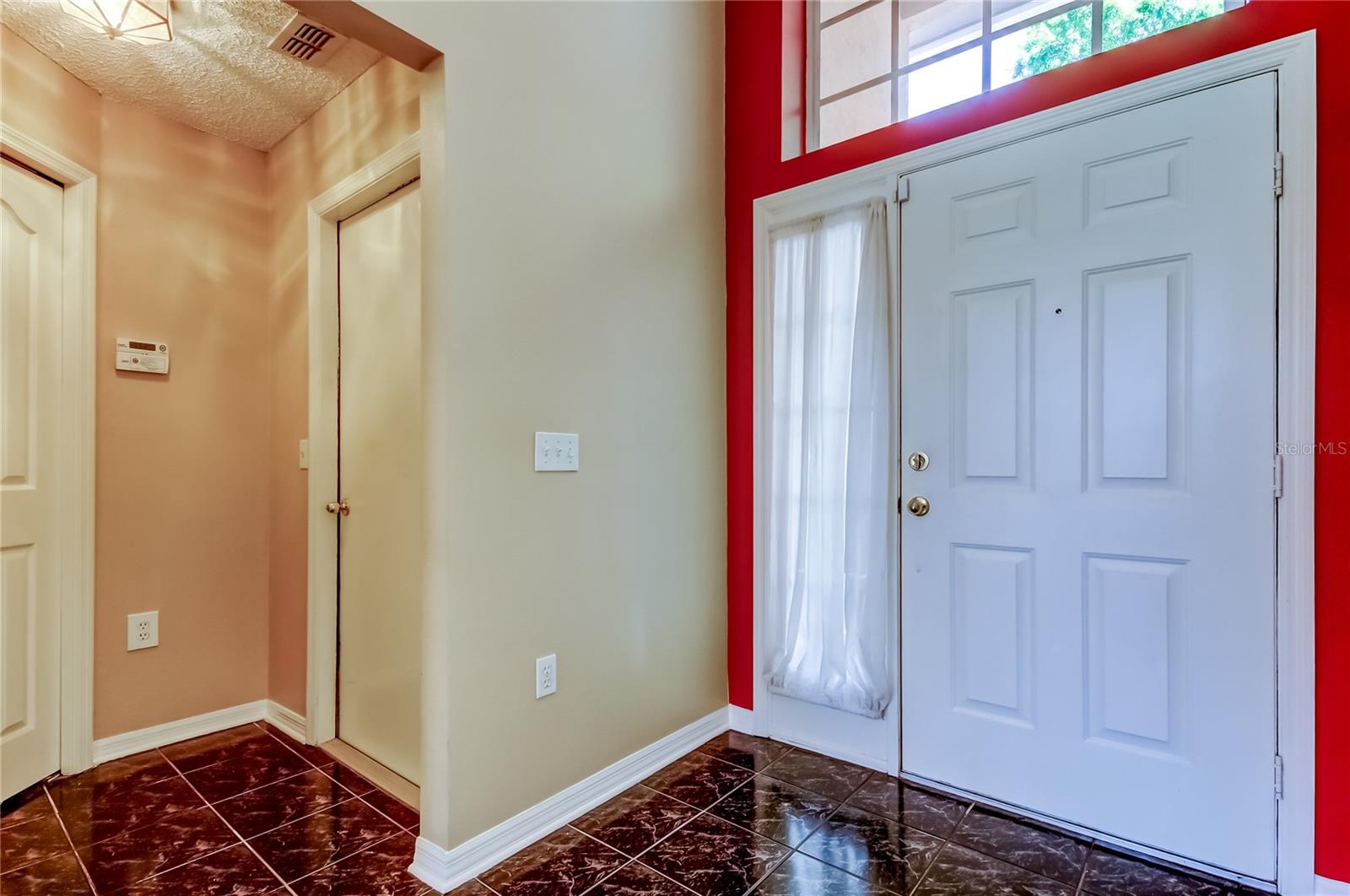 Listing photo id 0 for 10002 Oasis Palm Drive