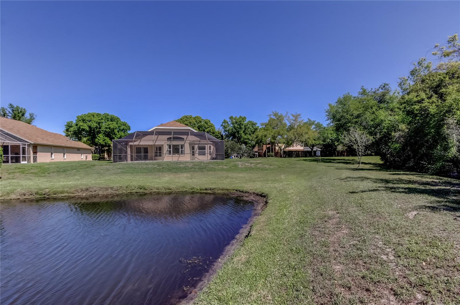 Listing photo id 66 for 10002 Oasis Palm Drive