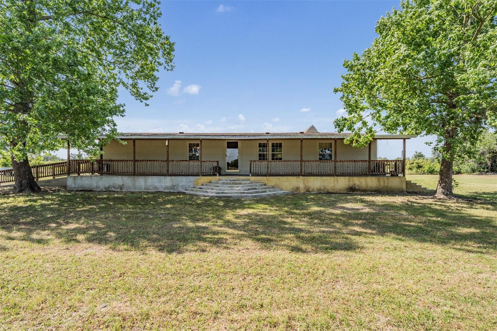 Listing photo id 0 for 6606 Gator Ranch Street